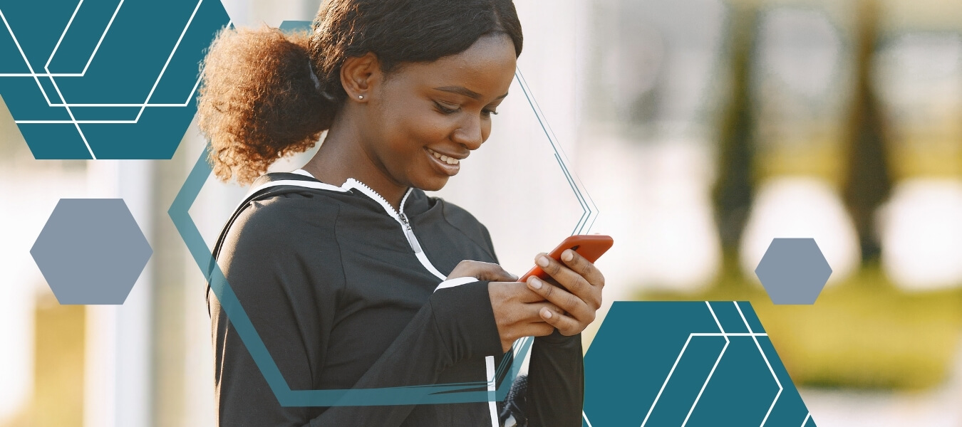Woman-using-a-health-app-on-her-phone-to-check-medical-aid-benefits